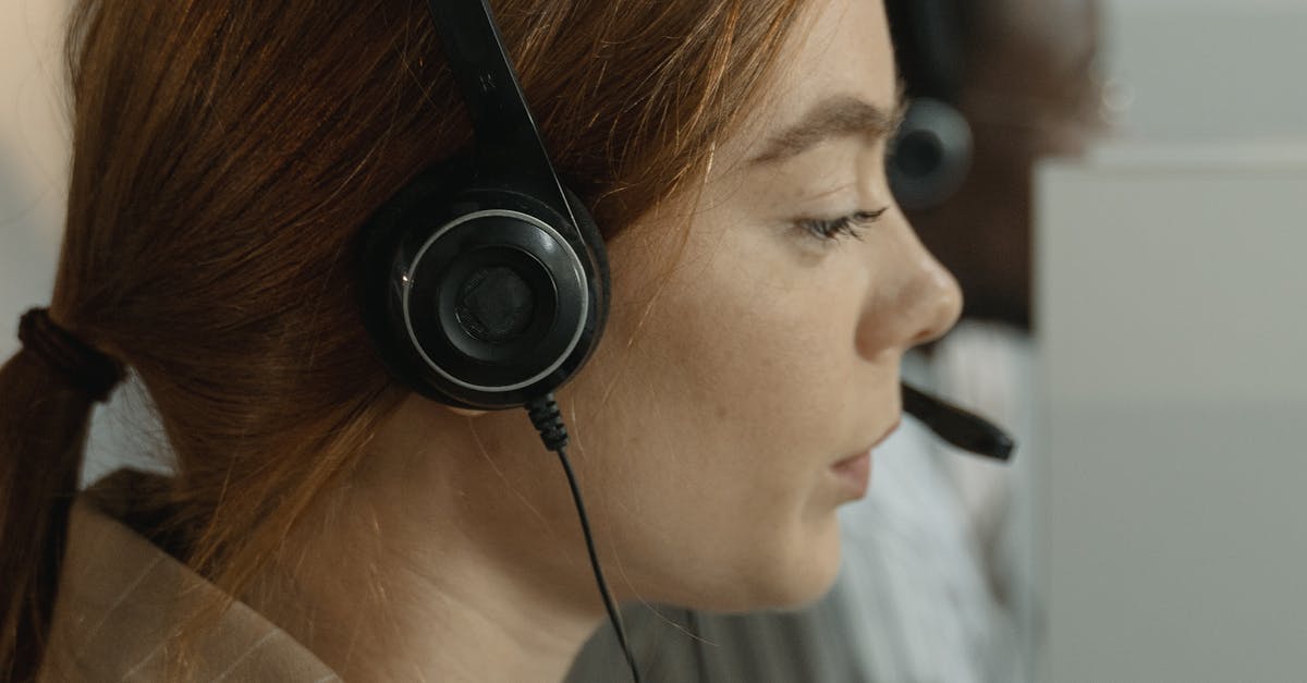 Dispatcher in the control room receiving status updates from an officer via voice commands.